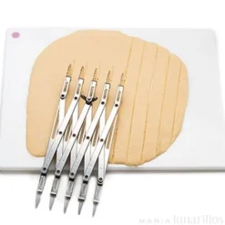 Cortador ajustable con 10 ruedas de corte - Decora