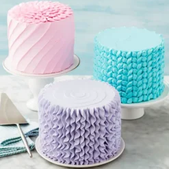 Kit 12 mangas, 4 boquillas y 2 adaptadores para decorar pasteles - Wilton