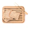 Tabla para cortar y servir con ranuras y pinzas 26 x 20 cm - Madera de bambú - Pebbly